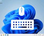 Symbolbild zeigt Piktogramm einer Tastatur und einer Maus auf einem Windows-11-Desktop