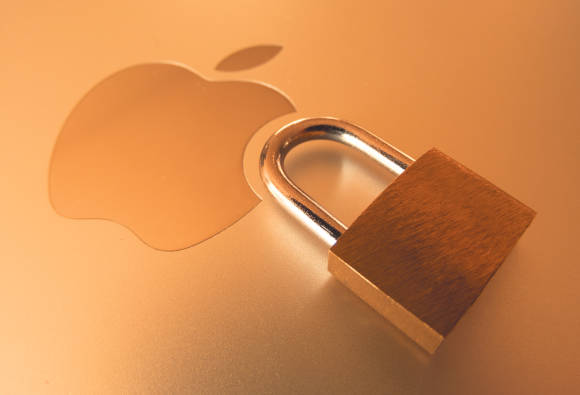 Symbolbild zeigt ein Vorhängeschloss auf einem Apple-Logo 