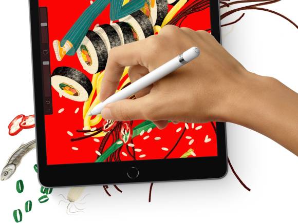 Auf einem iPad 9 wird mit dem Apple Pencil an einer roten Zeichnung gearbeitet 
