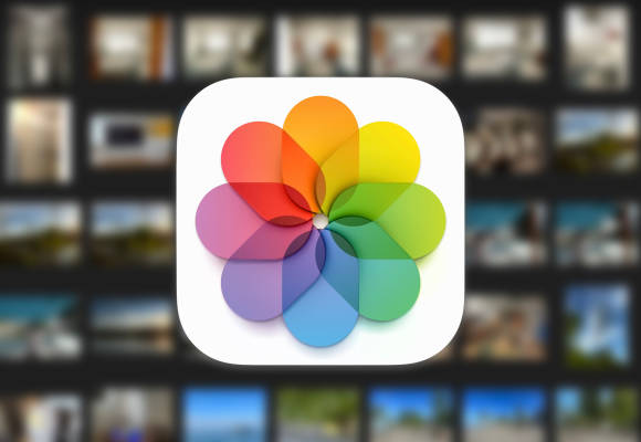 Fotos ist für viele Anwender die wichtigste Anwendung überhaupt Auf dem Bild ist das Programmsymbol der Fotos-Anwendung zu sehen; im unscharfen Hintergrund sind zahlreiche Bilder
