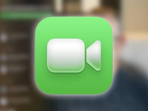 Im unscharfen Hintergrund ist das Fenster der Software Face Time zu sehen; der Vordergrund wird von seinem Programmsymbol dominiert 