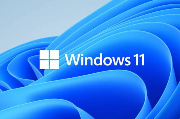 Ein Windows 11-Logo auf dem Windows-11-typischen Desktop-Hintergrund 