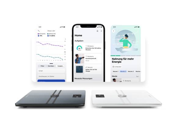Die Personenwaage im Vordergrund (schwarz, weiss), im Hintergrund die zugehörigen Apps auf einem Smartphone 
