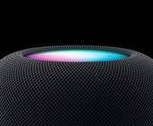 Das beleuchtete Bedienfeld eines schwarzen HomePods