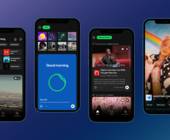 Verschiedene Spotify-Ansichten auf vier Smartphones