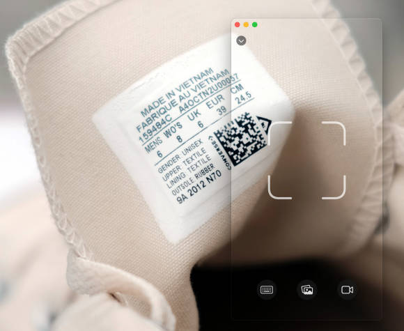 Das transparente Fenster der Anwendung über dem Bild eines QR-Codes