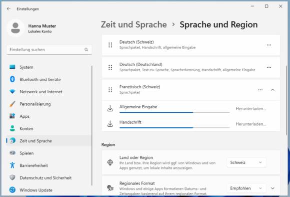 Die Sprachkomponenten werden heruntergeladen, wie Fortschrittsbalken zeigen