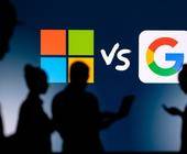 Symbolbild zeigt Silhouetten einiger Personen, vor einem Microsoft- und einem Google-Logo