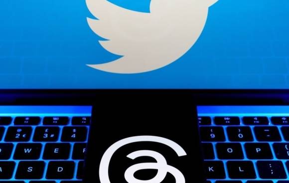 Symbolbild zeigt die Logos von Meta Threads und Twitter 