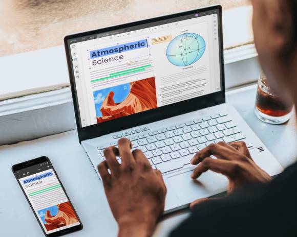 Person arbeitet an einem Notebook mit der UPDF Software 