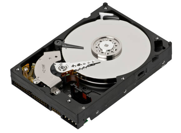 Bild 1: Das Innere einer HDD: drei Magnetscheiben, Lese-/Schreibkopf, Mechanik